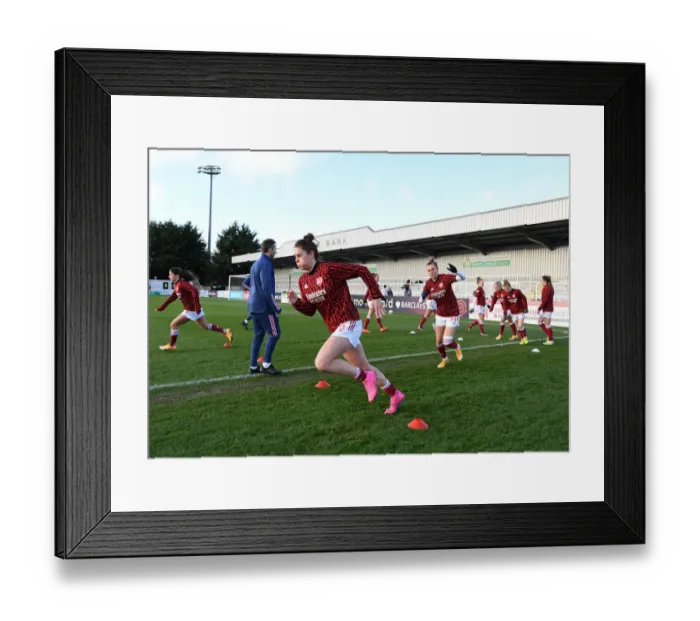Framed Print : Arsenal Women's Squad Gears Up: Intense Warm-Up Before Arsenal vs. Everton FA WSL Match