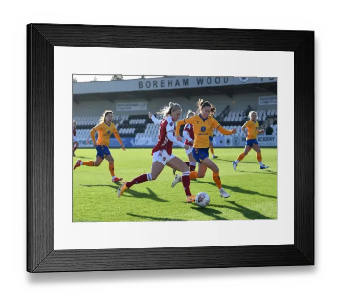 Framed Print : Arsenal's Beth Mead vs Everton's Danielle Turner: A FA WSL Rivalry Ignites on the Field