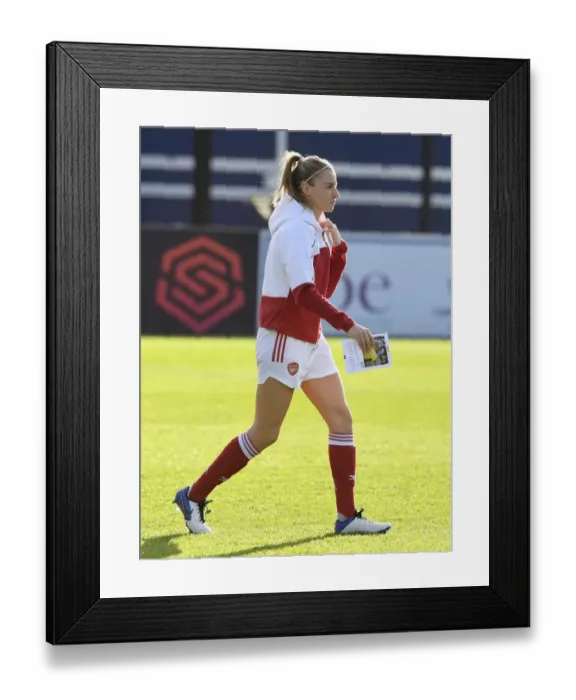 Framed Print : Arsenal Women Honor Community Member at FA WSL Match vs. Everton