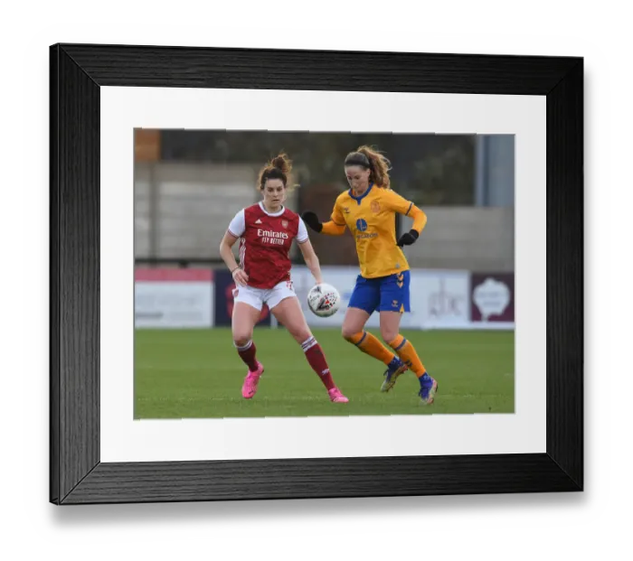 Framed Print : Arsenal's Jennifer Beattie Shuts Down Everton's Nicoline Sorensen in FA WSL Clash