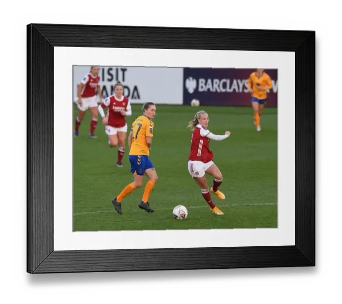 Framed Print : Arsenal's Beth Mead vs Everton's Lucy Graham: A Tense Showdown in FA WSL