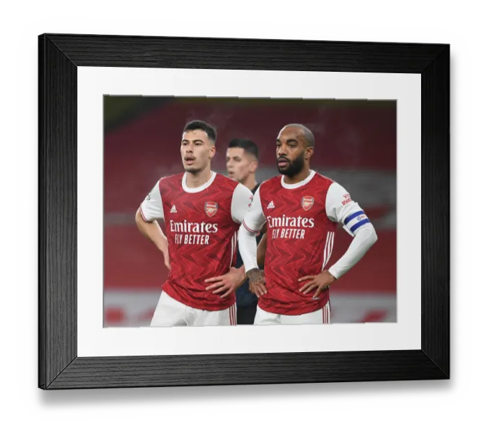Framed Print : Arsenal's Martinelli and Lacazette in Action: Carabao Cup Quarterfinal vs Manchester City at Empty Emirates Stadium