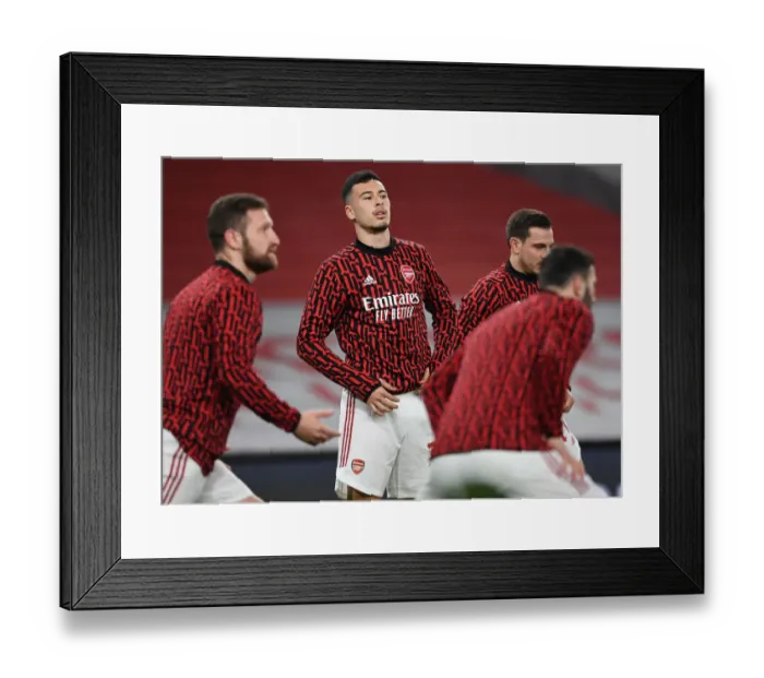Framed Print : Arsenal's Gabriel Martinelli: Pre-Match Focus Before Carabao Cup Clash with Manchester City (Behind Closed Doors) Framed Print : Arsenal's Gabriel Martinelli: Pre-Match Focus Before Carabao Cup Clash with Manchester City (Behind Closed Doors)