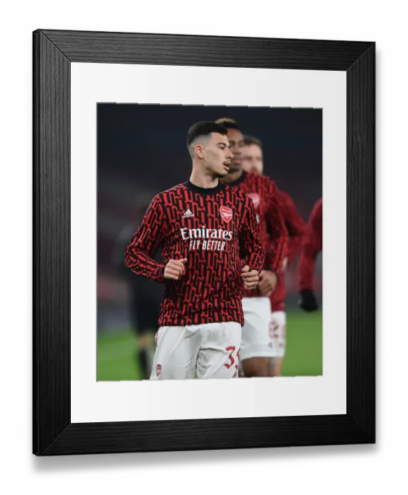 Framed Print : Gabriel Martinelli Gears Up: Arsenal vs Manchester City Carabao Cup Showdown at Empty Emirates Stadium