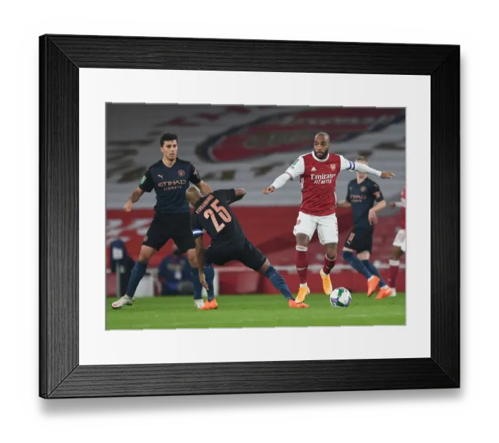 Framed Print : Arsenal's Lacazette Outmaneuvers Manchester City's Fernandinho in Carabao Cup Clash