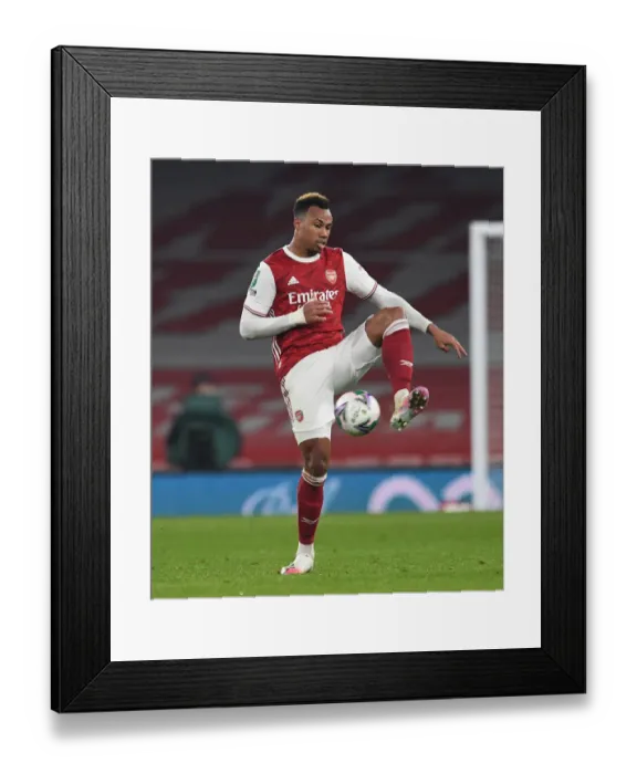 Framed Print : Arsenal's Gabriel Magalhaes Faces Off Against Manchester City in Carabao Cup Battle