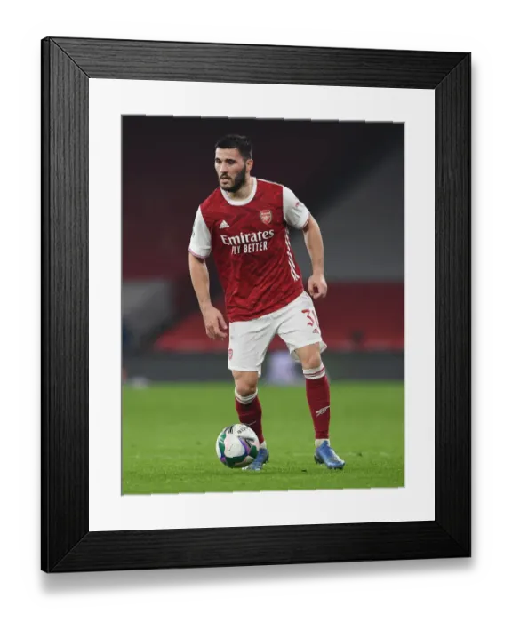 Framed Print : Arsenal's Sead Kolasinac in Action at Empty Emirates: Carabao Cup Quarterfinal vs Manchester City