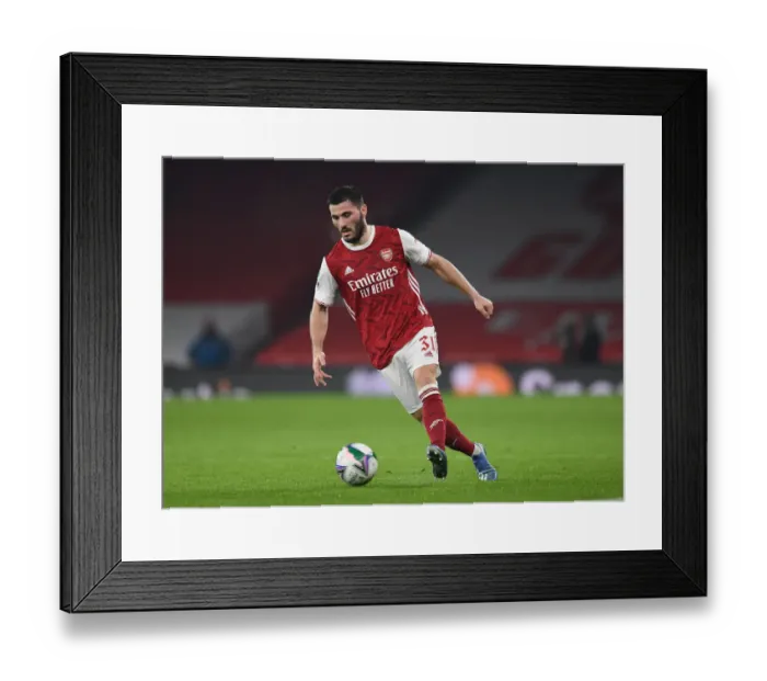 Framed Print : Arsenal's Sead Kolasinac in Action at Empty Emirates Stadium: Carabao Cup Quarterfinal vs Manchester City
