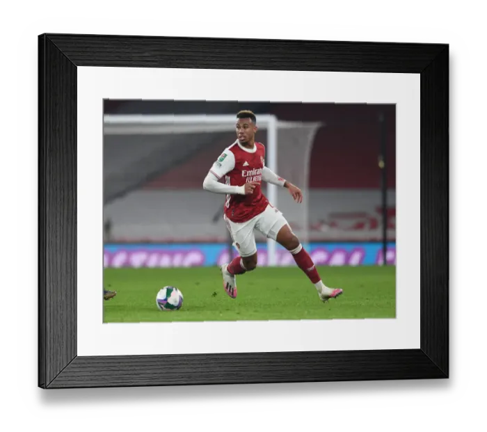 Framed Print : Arsenal's Gabriel Magalhaes in Action at Emptied Emirates: Carabao Cup Quarterfinal vs Manchester City
