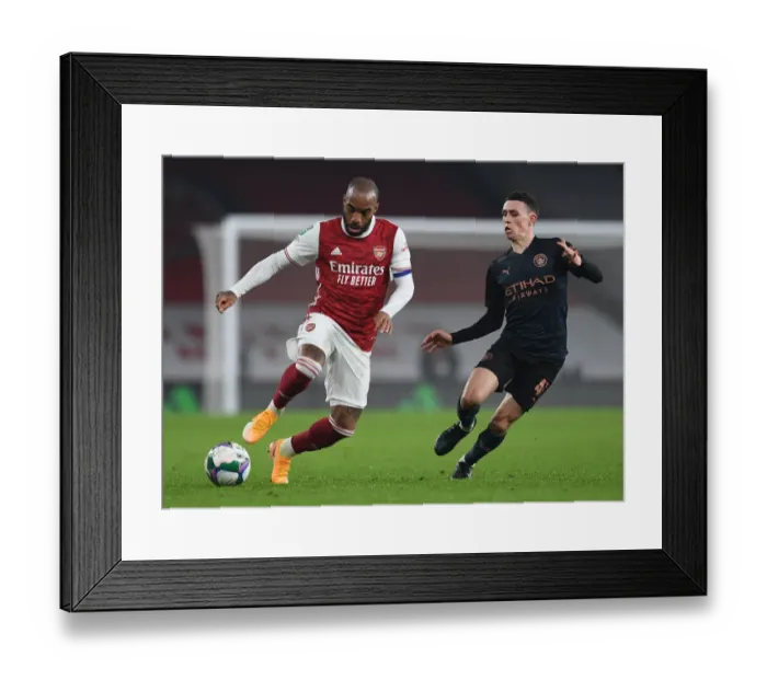 Framed Print : Empty Emirates Rivalry: Lacazette vs Foden - Arsenal vs Manchester City Carabao Cup Showdown