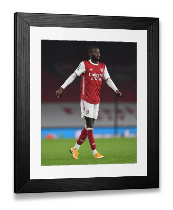 Framed Print : Arsenal's Pepe Stars in Empty Emirates: Carabao Cup Quarterfinal vs Manchester City Framed Print : Arsenal's Pepe Stars in Empty Emirates: Carabao Cup Quarterfinal vs Manchester City