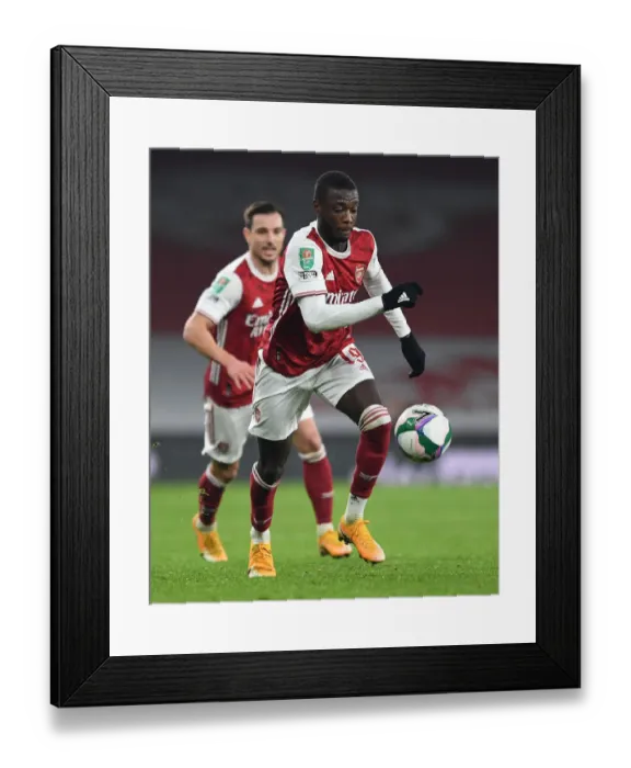 Framed Print : Arsenal's Pepe Shines in Empty Emirates: Carabao Cup Quarterfinal vs Manchester City