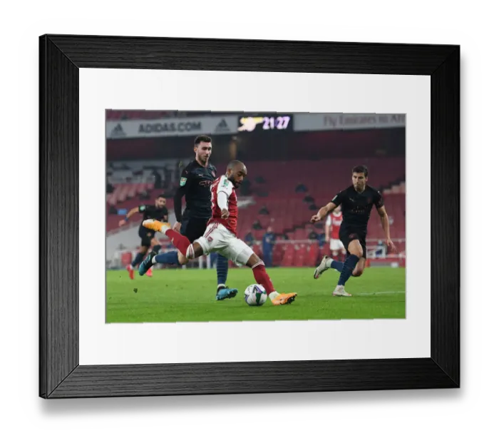 Framed Print : Arsenal's Lacazette Faces Off Against Manchester City's Laporte and Dias in Carabao Cup Quarterfinal Showdown Framed Print : Arsenal's Lacazette Faces Off Against Manchester City's Laporte and Dias in Carabao Cup Quarterfinal Showdown