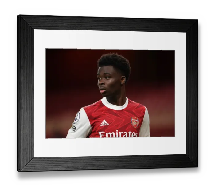 Framed Print : Arsenal's Bukayo Saka in Action Against Chelsea - Premier League 2020-21 (Behind Closed Doors)