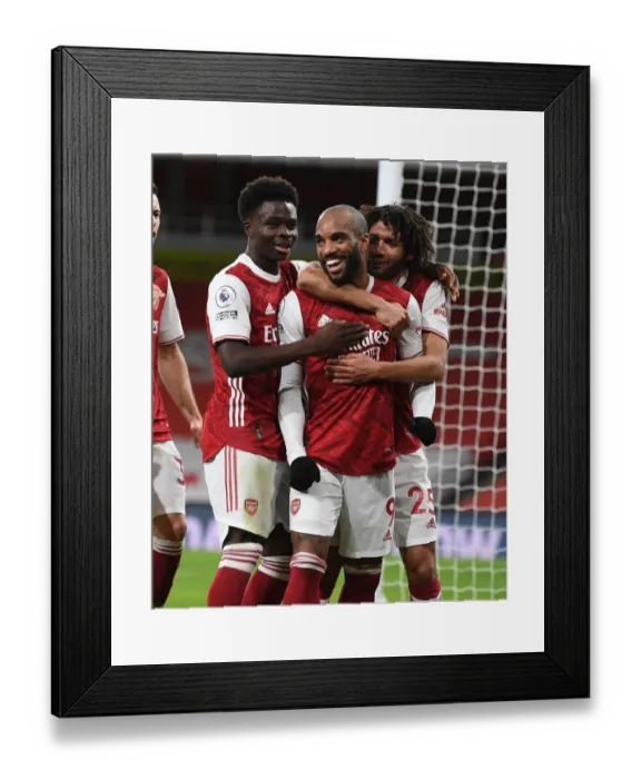 Framed Print : Arsenal Celebrate Lacazette's Goal Against Chelsea in Empty Emirates Stadium (2020-21)