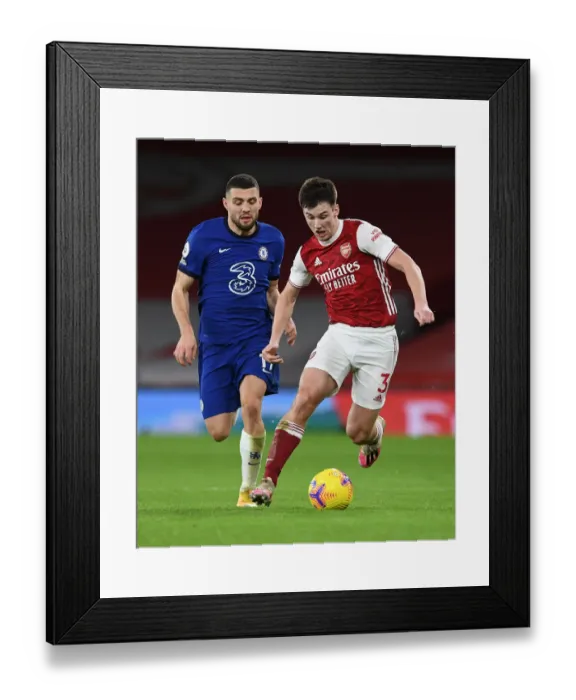 Framed Print : Tierney vs. Kovacic: A Premier League Showdown at Emirates Stadium Framed Print : Tierney vs. Kovacic: A Premier League Showdown at Emirates Stadium