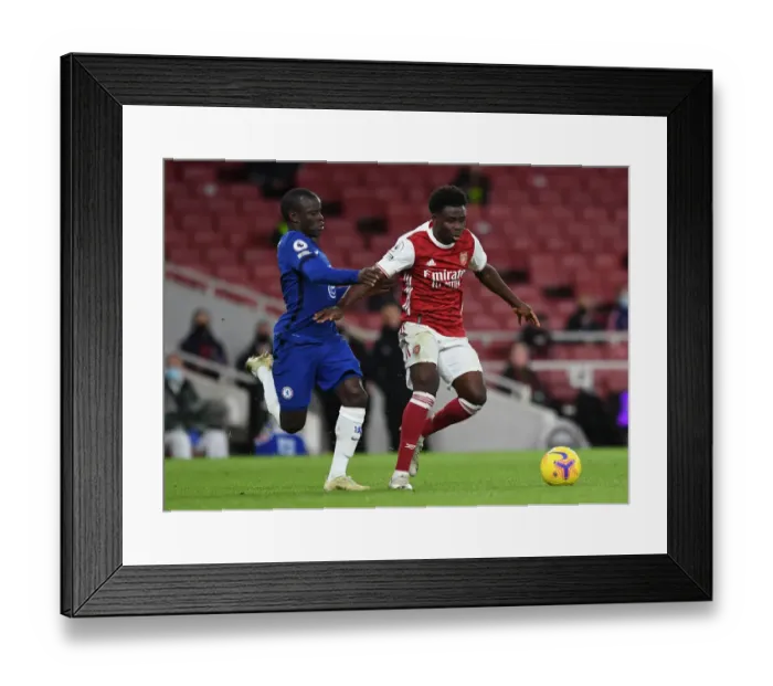 Framed Print : Saka vs. Kante: Intense Rivalry Unfolds in Arsenal vs. Chelsea Premier League Showdown Framed Print : Saka vs. Kante: Intense Rivalry Unfolds in Arsenal vs. Chelsea Premier League Showdown