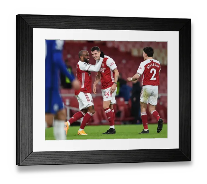 Framed Print : Arsenal's Xhaka and Lacazette: Celebrating a Victory Goal Over Chelsea (2020-21)