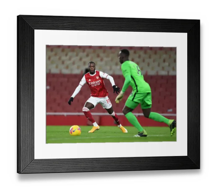 Framed Print : Arsenal vs Chelsea: Pepe in Action at the Emirates Stadium - Premier League 2020-21 Framed Print : Arsenal vs Chelsea: Pepe in Action at the Emirates Stadium - Premier League 2020-21