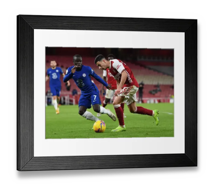 Framed Print : Arsenal's Martinelli Clashes with Chelsea's Kante in Premier League Showdown