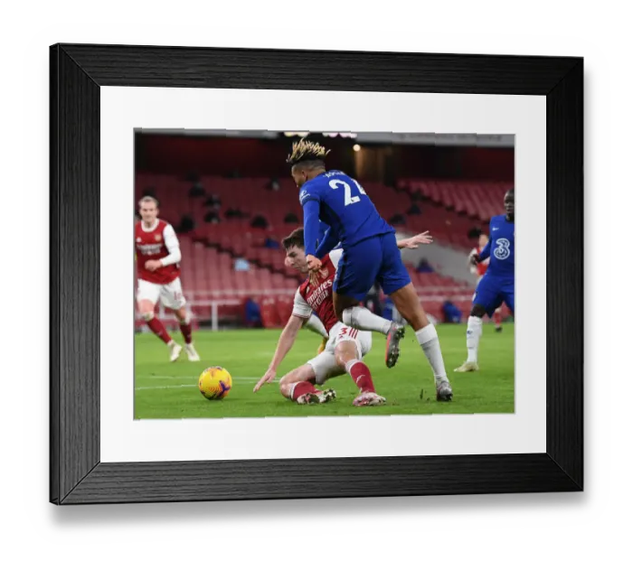 Framed Print : Arsenal vs Chelsea: Tierney Fouls Lead to Penalty in Premier League Clash