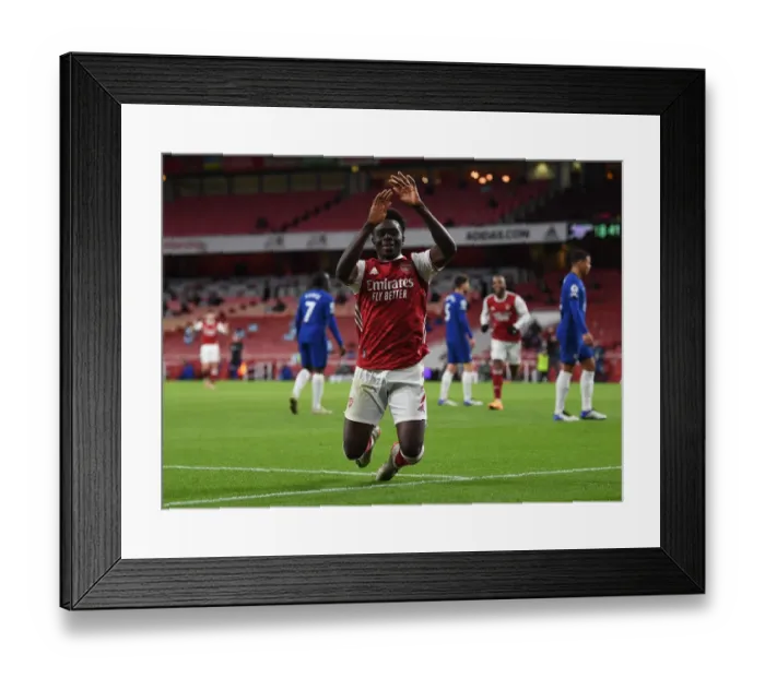 Framed Print : Arsenal's Bukayo Saka Celebrates Goal Against Chelsea in Premier League Showdown (Arsenal v Chelsea 2020-21)
