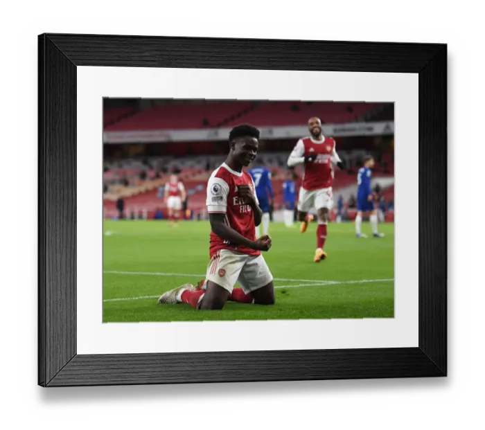 Framed Print : Arsenal's Bukayo Saka Scores Third Goal in Arsenal v Chelsea Premier League Clash (December 2020) Framed Print : Arsenal's Bukayo Saka Scores Third Goal in Arsenal v Chelsea Premier League Clash (December 2020)