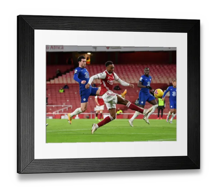 Framed Print : Arsenal's Joe Willock Faces Off Against Chelsea's Ben Chilwell in Intense Premier League Showdown