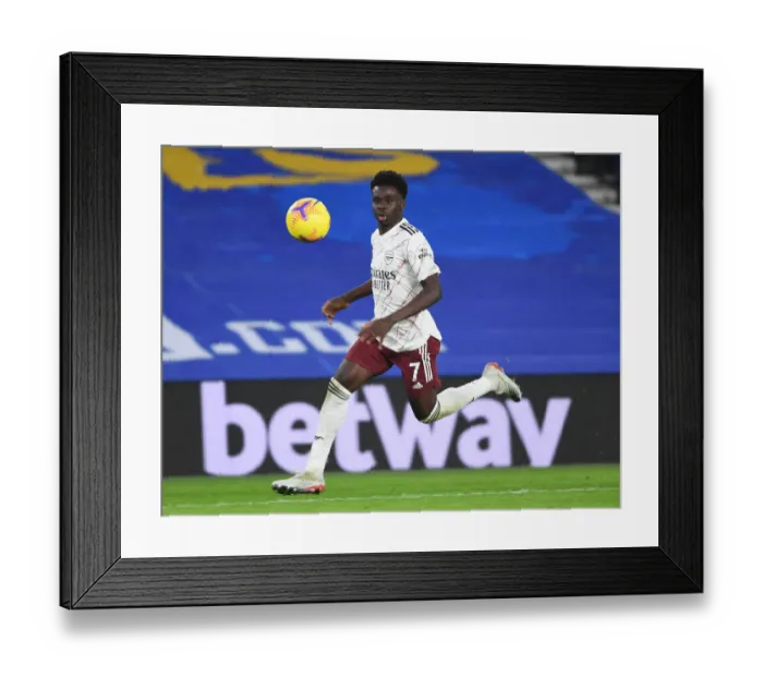 Framed Print : Brighton vs. Arsenal: Saka Shines in Empty American Express Community Stadium (Premier League 2020-21)
