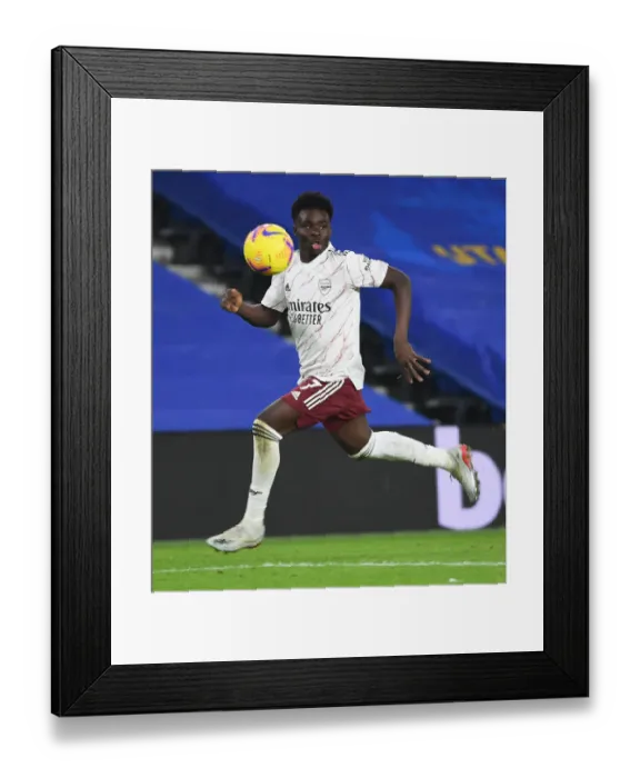 Framed Print : Brighton vs Arsenal: Saka Shines in Empty American Express Community Stadium - Premier League 2020-21 Framed Print : Brighton vs Arsenal: Saka Shines in Empty American Express Community Stadium - Premier League 2020-21