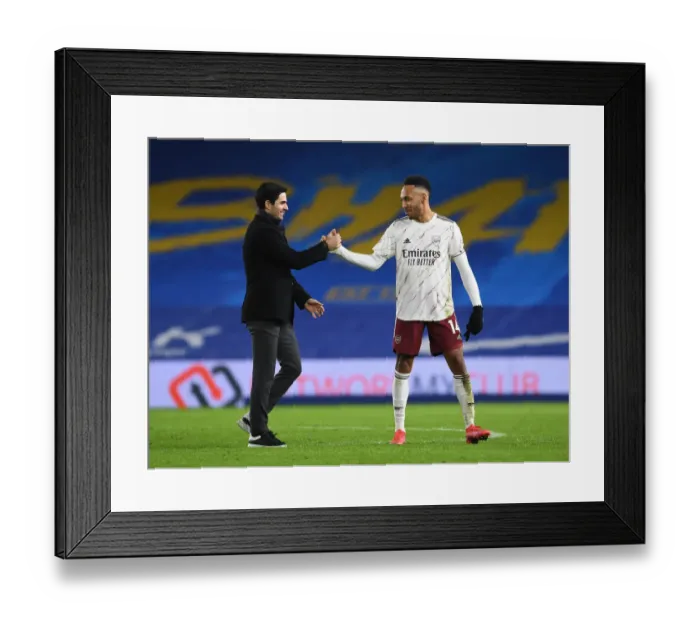 Framed Print : Arsenal Secure Empty-Stadium Win Against Brighton & Hove Albion