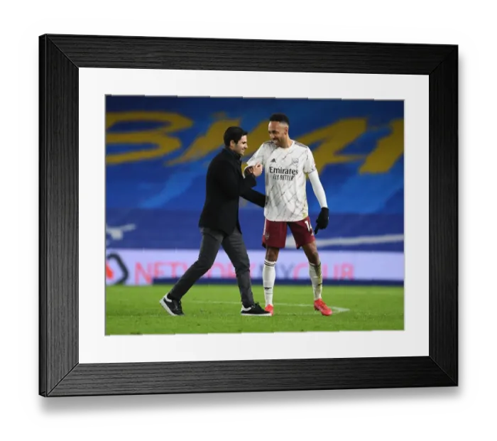 Framed Print : Arsenal Celebrate Win Against Brighton & Hove Albion in Empty American Express Community Stadium