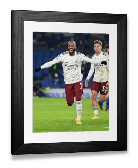 Framed Print : Alexandre Lacazette Scores for Arsenal Against Brighton & Hove Albion in Premier League