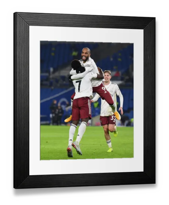 Framed Print : Lacazette and Saka Celebrate Goal: Brighton & Hove Albion vs. Arsenal, Premier League 2020-21