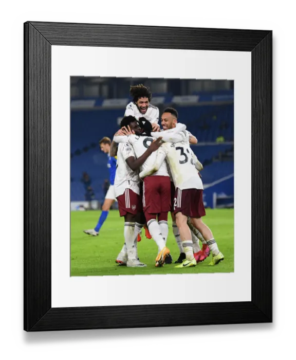 Framed Print : Arsenal's Lacazette, Aubameyang, and Elneny Celebrate Goal Against Brighton in Premier League
