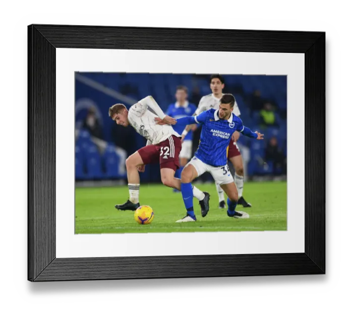 Framed Print : Brighton vs. Arsenal: Emile Smith Rowe Faces Off Against Joel Veltman in Premier League Clash