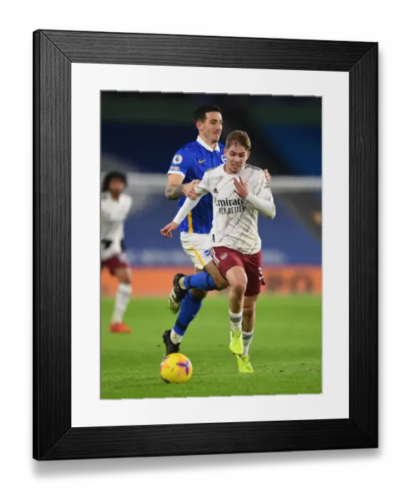 Framed Print : Brighton vs. Arsenal: Emile Smith Rowe Faces Lewis Dunk in Premier League Clash Framed Print : Brighton vs. Arsenal: Emile Smith Rowe Faces Lewis Dunk in Premier League Clash