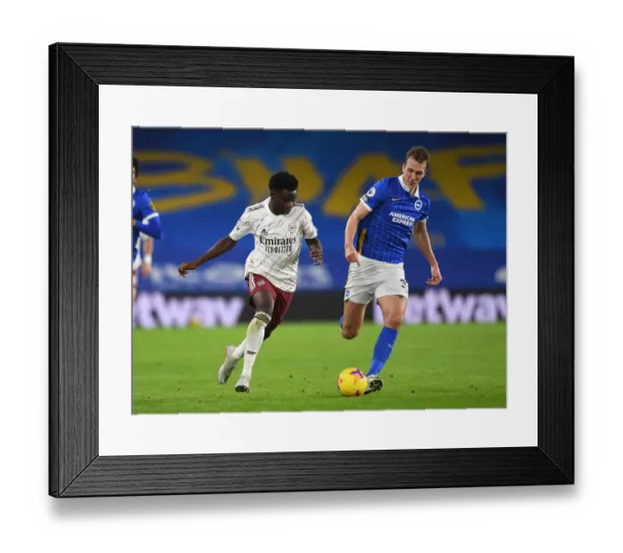 Framed Print : Bukayo Saka vs. Dan Burn: A Tactical Showdown in Arsenal's Clash with Brighton, Premier League 2020-21