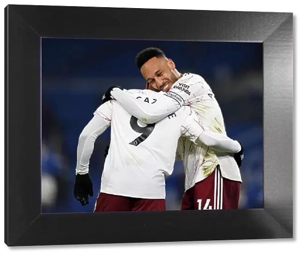 Arsenal's Lacazette and Aubameyang: A Deadly Duo Celebrates Goal Scoring Success Against Brighton & Hove Albion