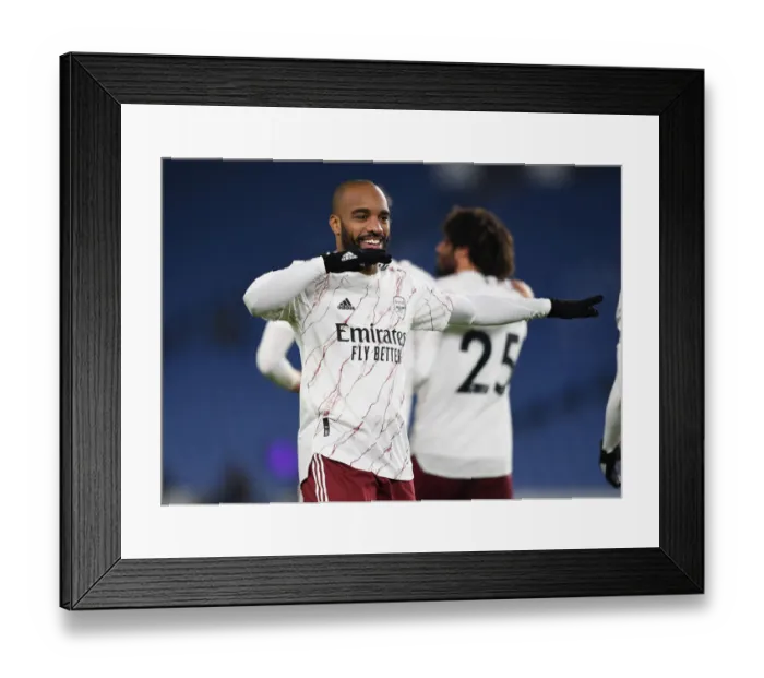 Framed Print : Lacazette Scores: Arsenal Triumph Over Brighton in Premier League Clash