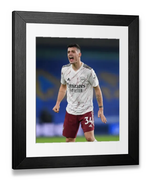 Framed Print : Granit Xhaka: Arsenal's Midfield Maestro Dazzles in Premier League Victory Against Brighton & Hove Albion Framed Print : Granit Xhaka: Arsenal's Midfield Maestro Dazzles in Premier League Victory Against Brighton & Hove Albion