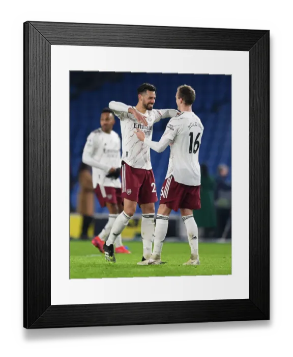 Framed Print : Arsenal's Pablo Mari and Rob Holding Celebrate Victory Over Brighton & Hove Albion in Premier League