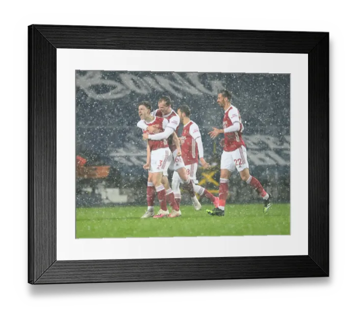 Framed Print : Kieran Tierney Scores the Winning Goal for Arsenal Against West Bromwich Albion (2021)