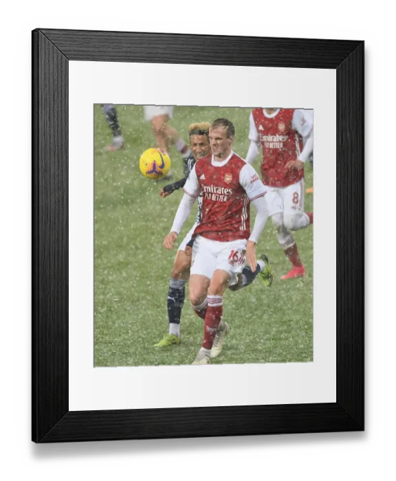 Framed Print : Rob Holding in Action: Arsenal's Defensive Battle at West Bromwich Albion, Premier League 2020-21 Framed Print : Rob Holding in Action: Arsenal's Defensive Battle at West Bromwich Albion, Premier League 2020-21