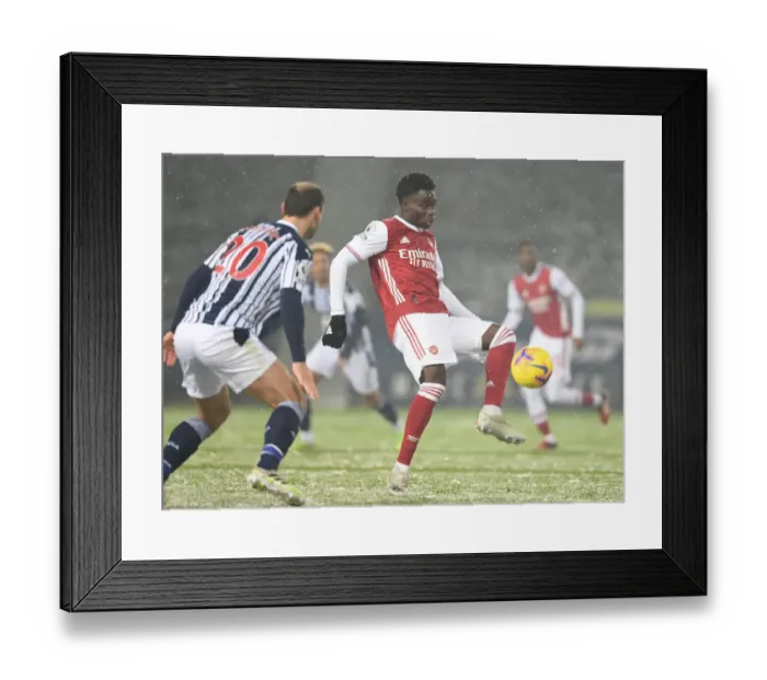 Framed Print : Bukayo Saka vs Branislav Ivanovic: A Battle in the Premier League - West Bromwich Albion vs Arsenal (January 2021)