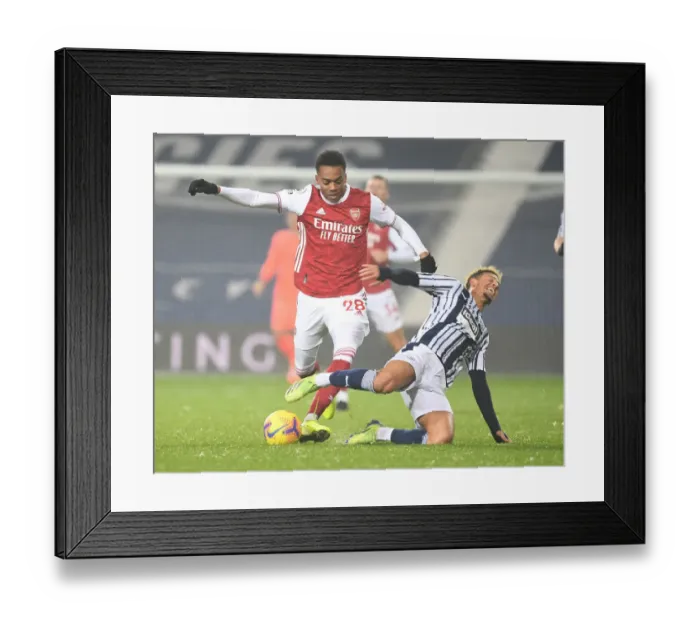 Framed Print : Intense Battle: Joe Willock vs. Callum Robinson - West Bromwich Albion vs. Arsenal Premier League Clash Framed Print : Intense Battle: Joe Willock vs. Callum Robinson - West Bromwich Albion vs. Arsenal Premier League Clash
