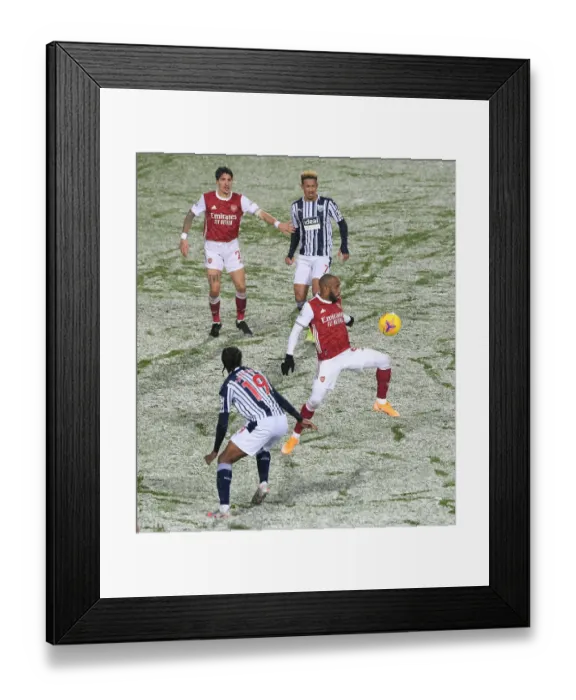 Framed Print : Arsenal's Lacazette Faces Off Against West Brom's Sawyers in Premier League Clash Framed Print : Arsenal's Lacazette Faces Off Against West Brom's Sawyers in Premier League Clash