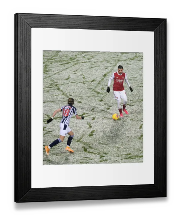 Framed Print : Dani Ceballos Under Pressure: A Tense Battle at The Hawthorns - West Bromwich Albion vs. Arsenal, Premier League 2020-21