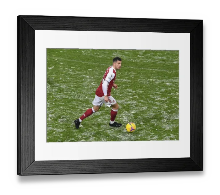 Framed Print : Granit Xhaka: Midfield Mastermind Shines in Arsenal's Premier League Triumph vs West Bromwich Albion Framed Print : Granit Xhaka: Midfield Mastermind Shines in Arsenal's Premier League Triumph vs West Bromwich Albion
