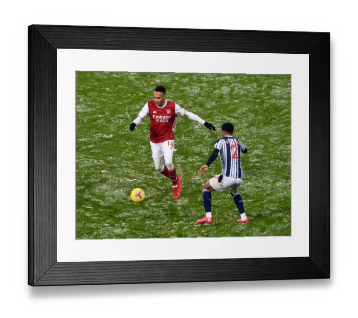 Framed Print : Aubameyang vs Furlong: Arsenal's Pierre-Emerick Takes on West Bromwich Albion's Darnell in Premier League Clash (January 2021) Framed Print : Aubameyang vs Furlong: Arsenal's Pierre-Emerick Takes on West Bromwich Albion's Darnell in Premier League Clash (January 2021)